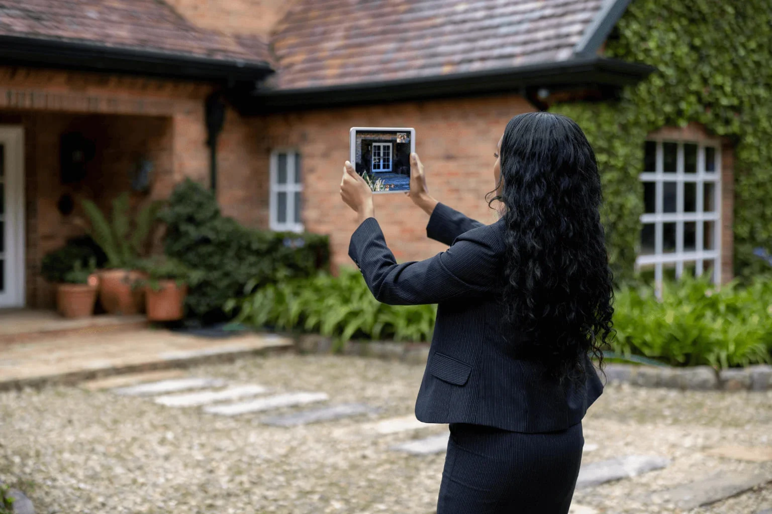 real estate agent showing a home