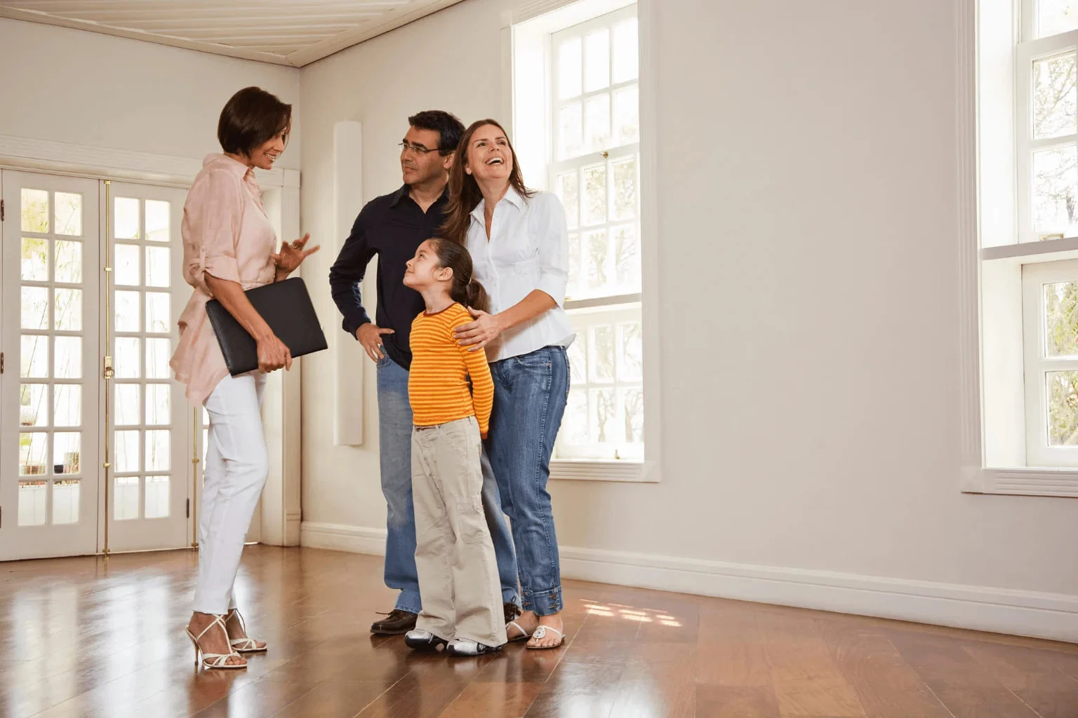 Realtor showing a home to a couple in Dublin