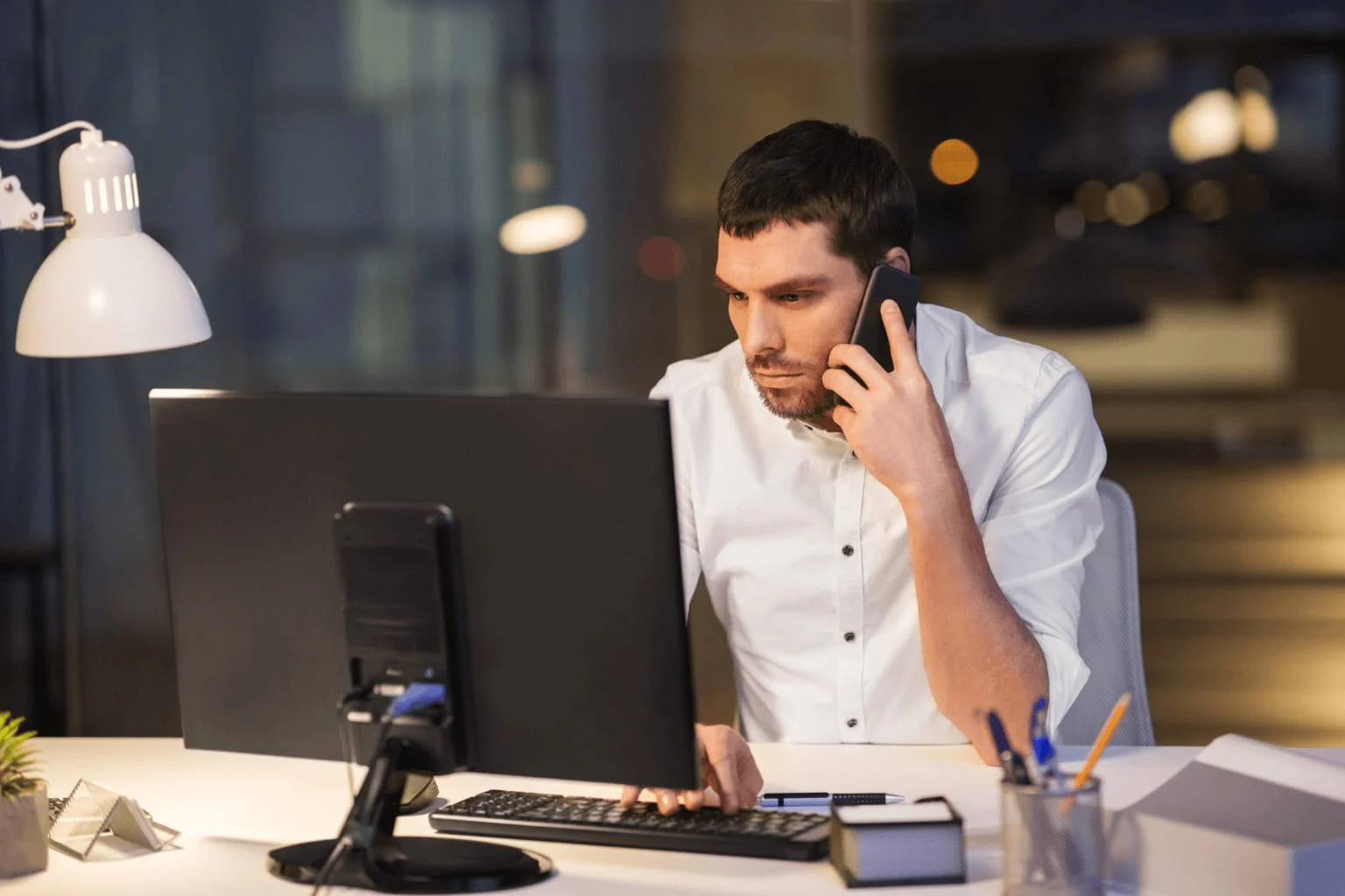 Pleasant Hill Realtor making evening phone calls and organizing documents