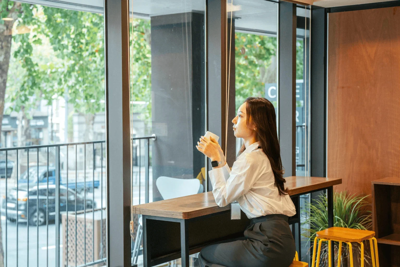 Real estate agent relaxing in a coffee shop during a break