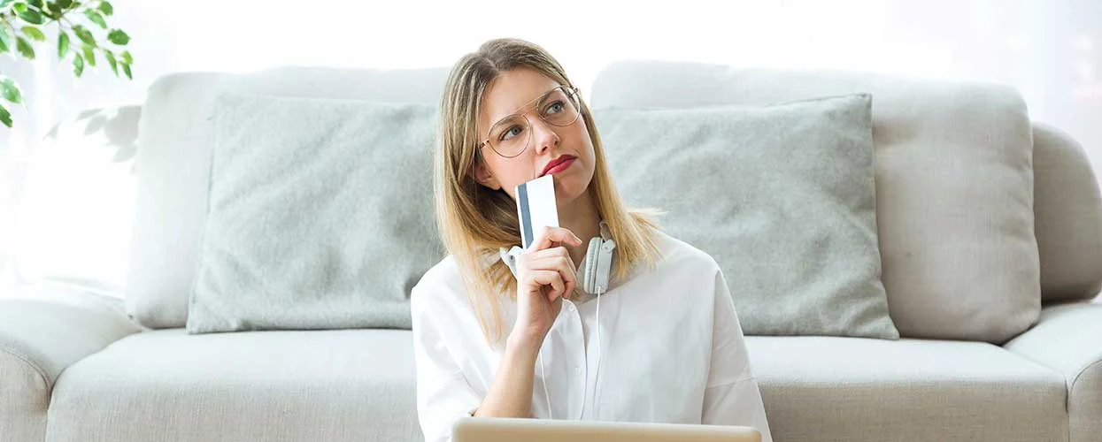 woman holding a card